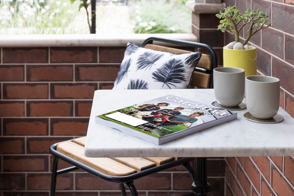 carolina country magazine sitting on table on front porch