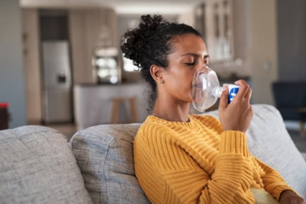 woman with oxygen mask