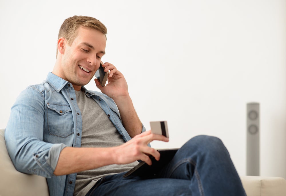 man paying by phone