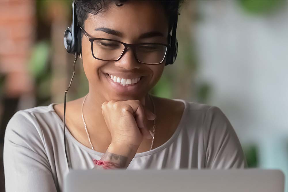 woman listening to podcast