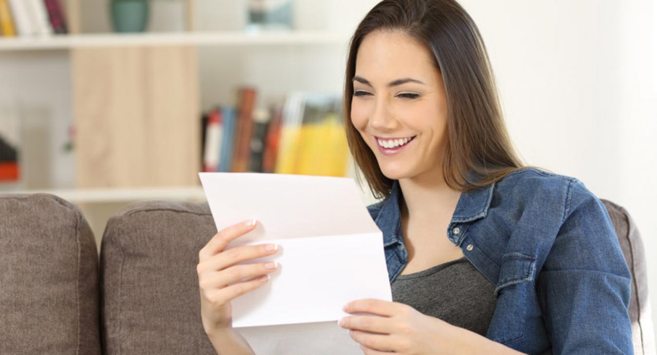 woman reading mail